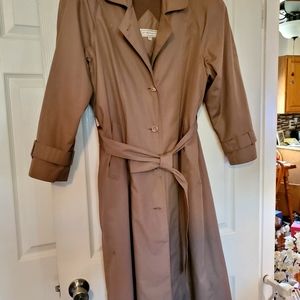 A base long trench coat style raincoat. It has a lining that can come in or out.